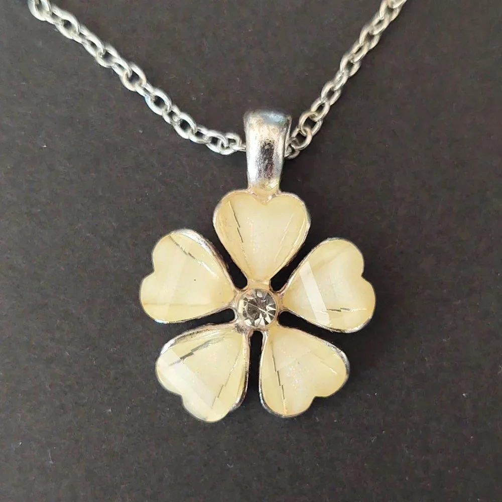 Cream flower pendant necklace with cz center and silver accents